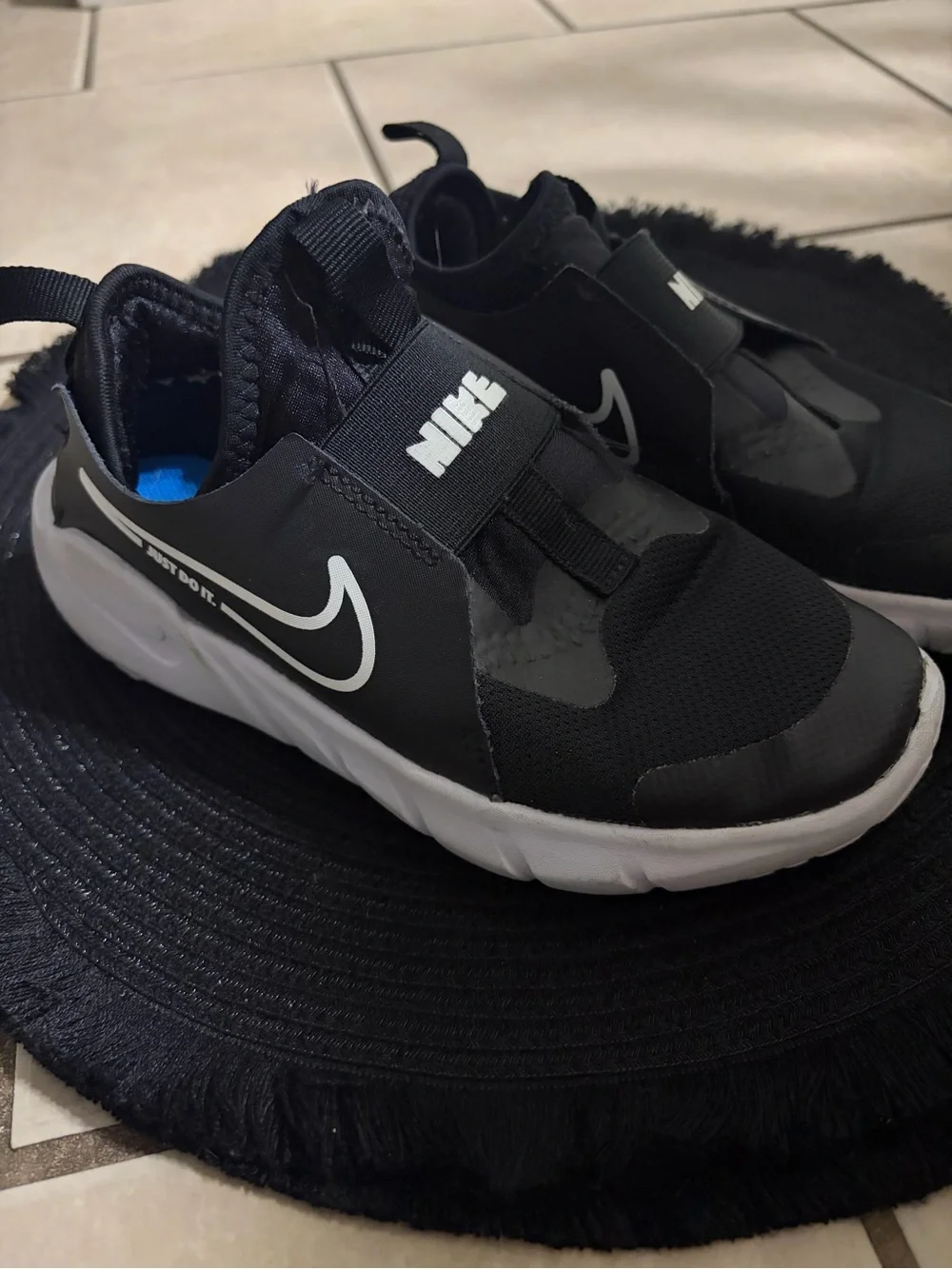 Nike Kids Black and White Slip-On Sneaker with Swoosh